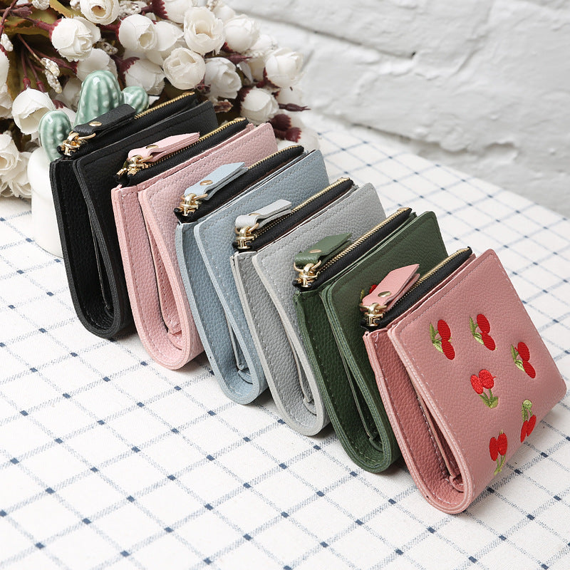 Porte-monnaie brodé cerises coloris vert