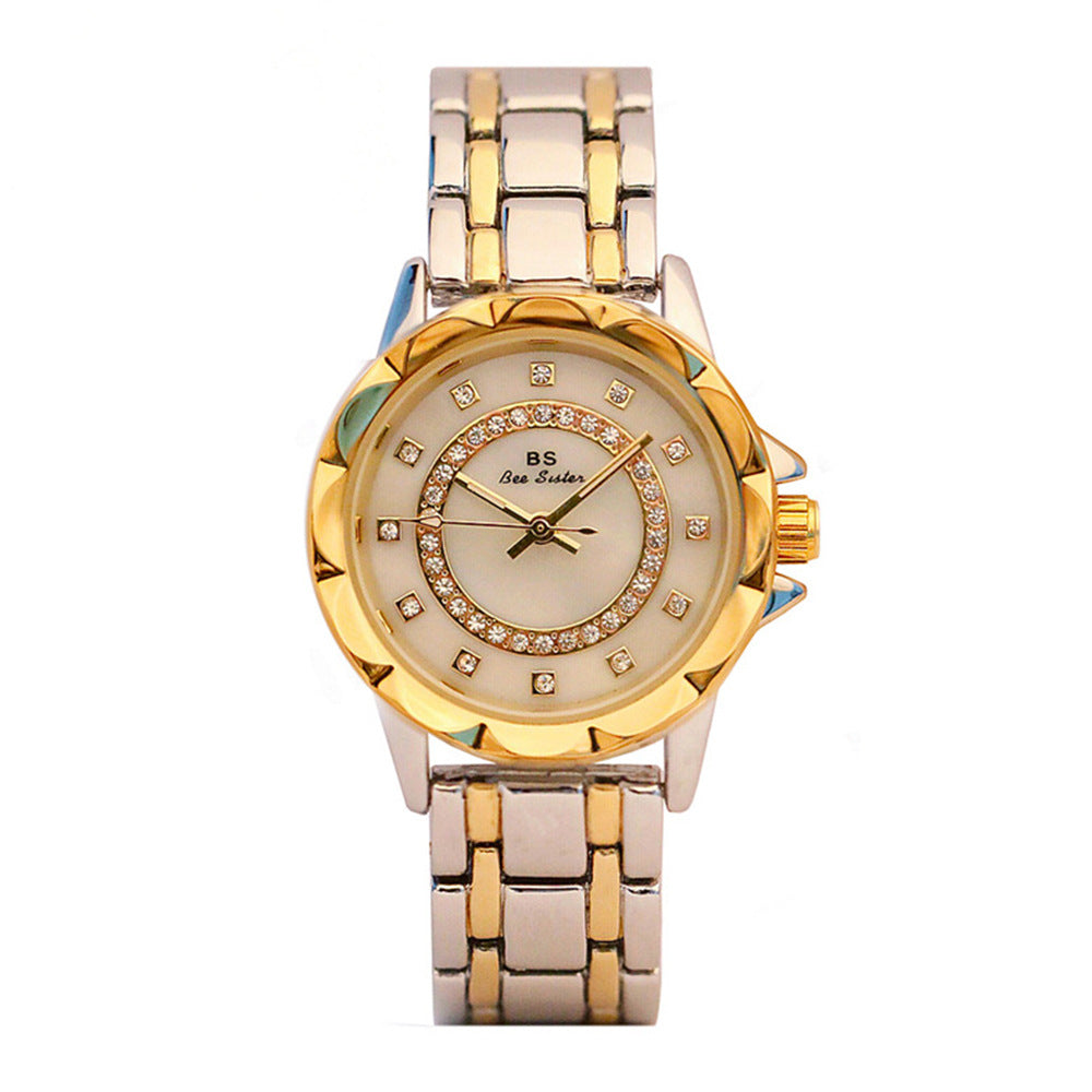 Montre femme Aurore sertie de cristaux, bracelet acier doré, style luxe