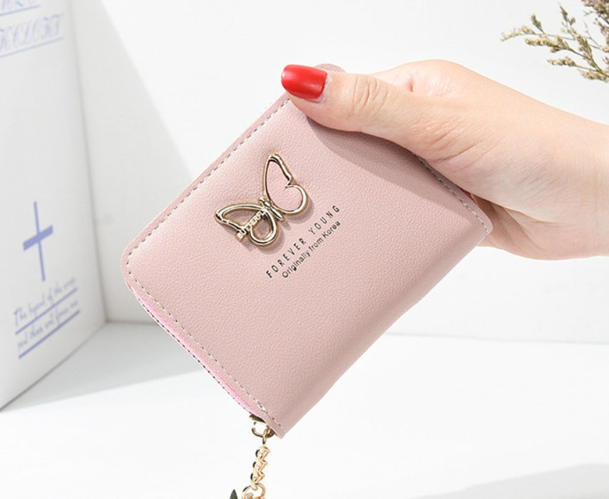 Porte-monnaie imprimé papillon coloris rose foncé