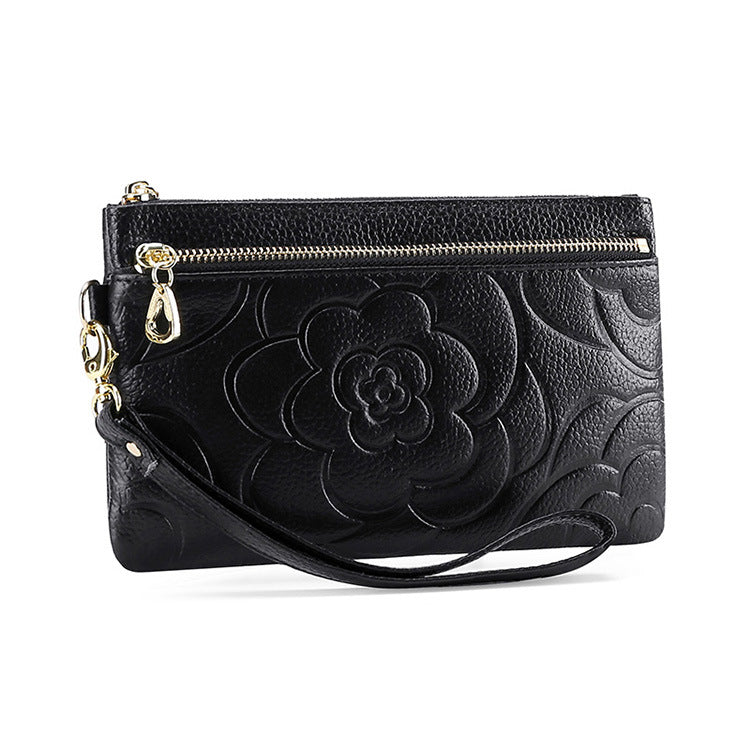 Porte-monnaie en cuir, détail de la fermeture zip
