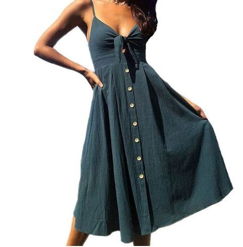 Robe d'été bleu canard à bretelles, nœud devant et jupe boutonnée