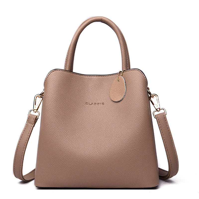 Sac à main ouvert, poches intérieures et compartiment zippé