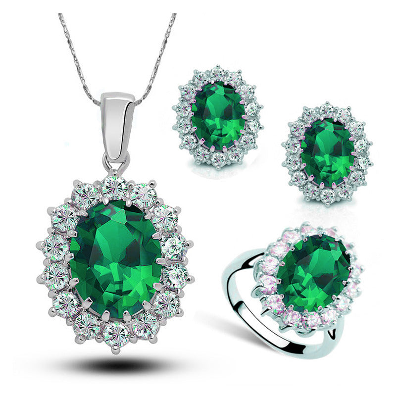 Parure argentée à cristal turquoise et à cristal rouge