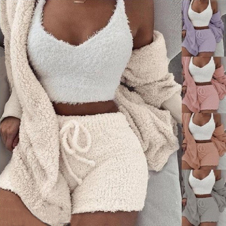 Ensemble pyjama en maille peluche noir présenté à plat