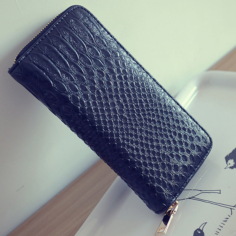 Pochette portefeuille, téléphone rangé à l'intérieur