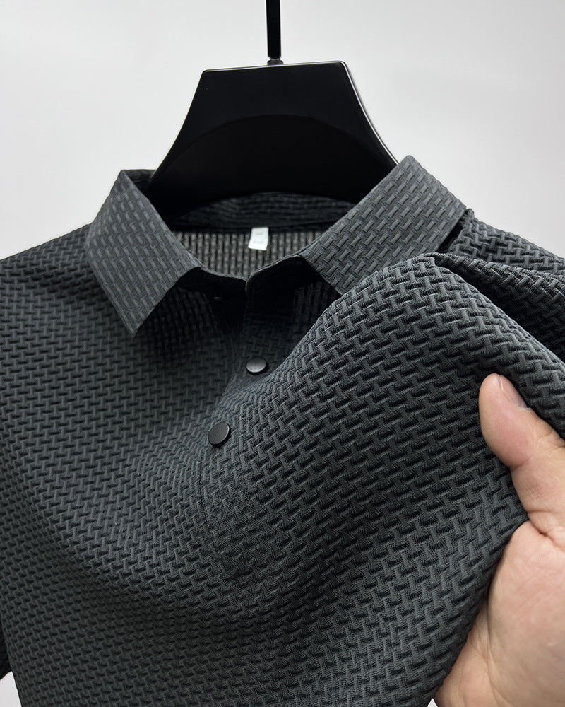 Polo en maille gaufrée gris foncé, col boutonné