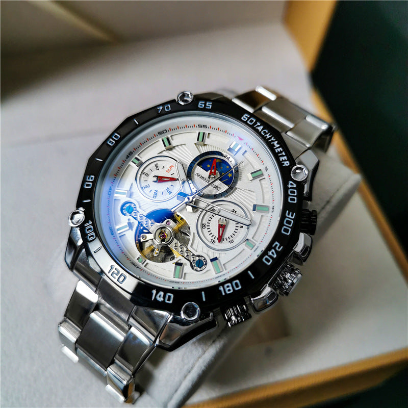 Montre Compas tout acier doré, cadran multifonction