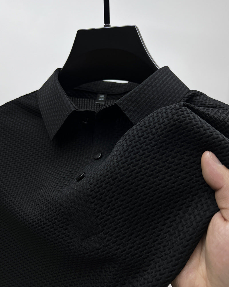 Polo en maille gaufrée noir, col boutonné