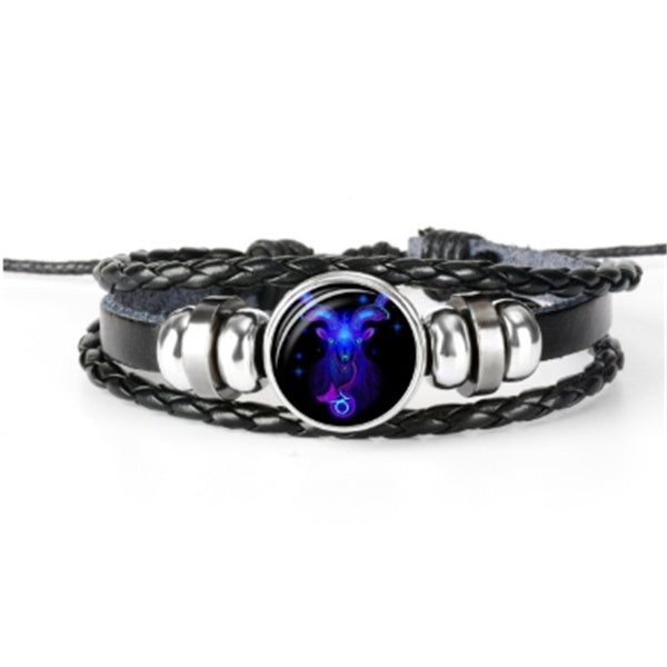 Cabochon constellation du Lion sur bracelet en cuir tressé