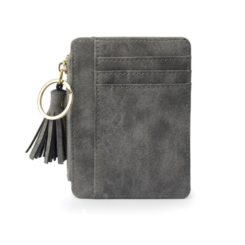 Petit porte-monnaie coloris gris