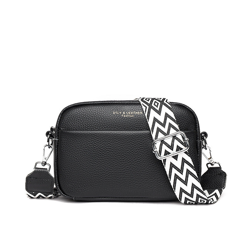 Petit sac bandoulière en cuir coloris noir