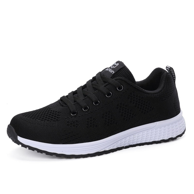 Baskets femme en maille noires, vue de profil