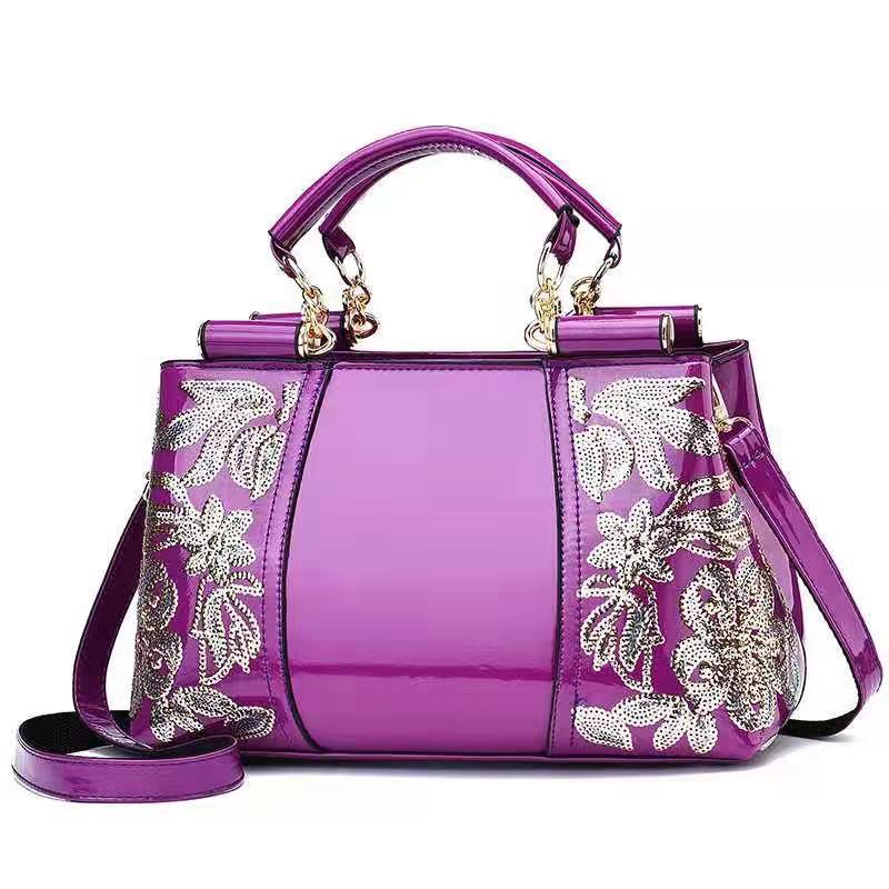 Sac à main de soirée brodé coloris prune