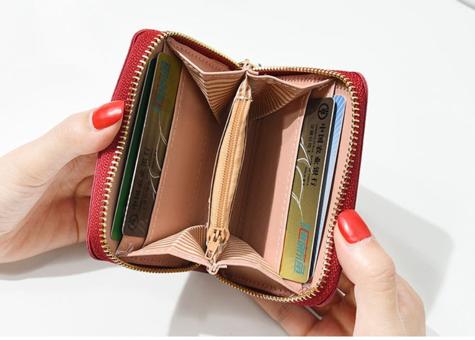 Porte-monnaie imprimé papillon coloris rose