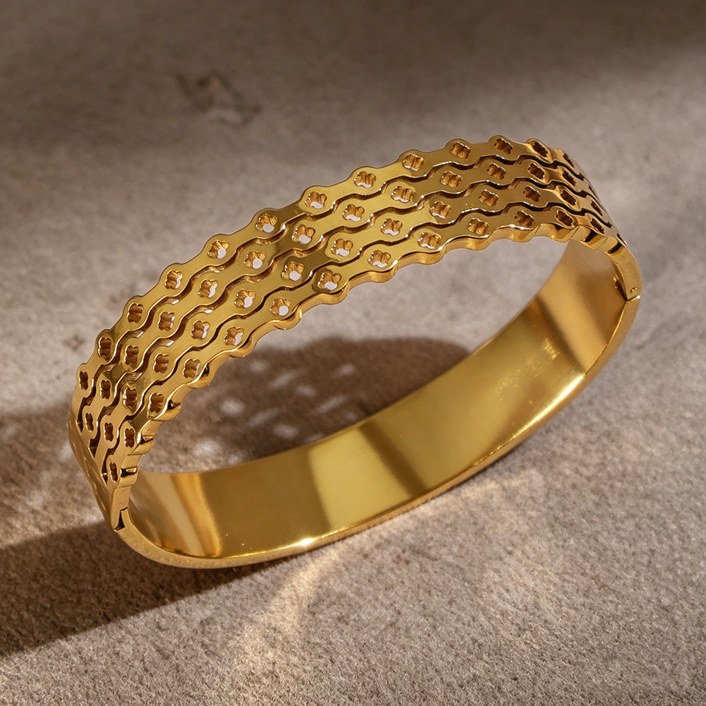 Bracelet Alvéole, motif nid d'abeille facetté en acier titane