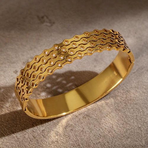 Bracelet Alvéole, motif nid d'abeille facetté en acier titane