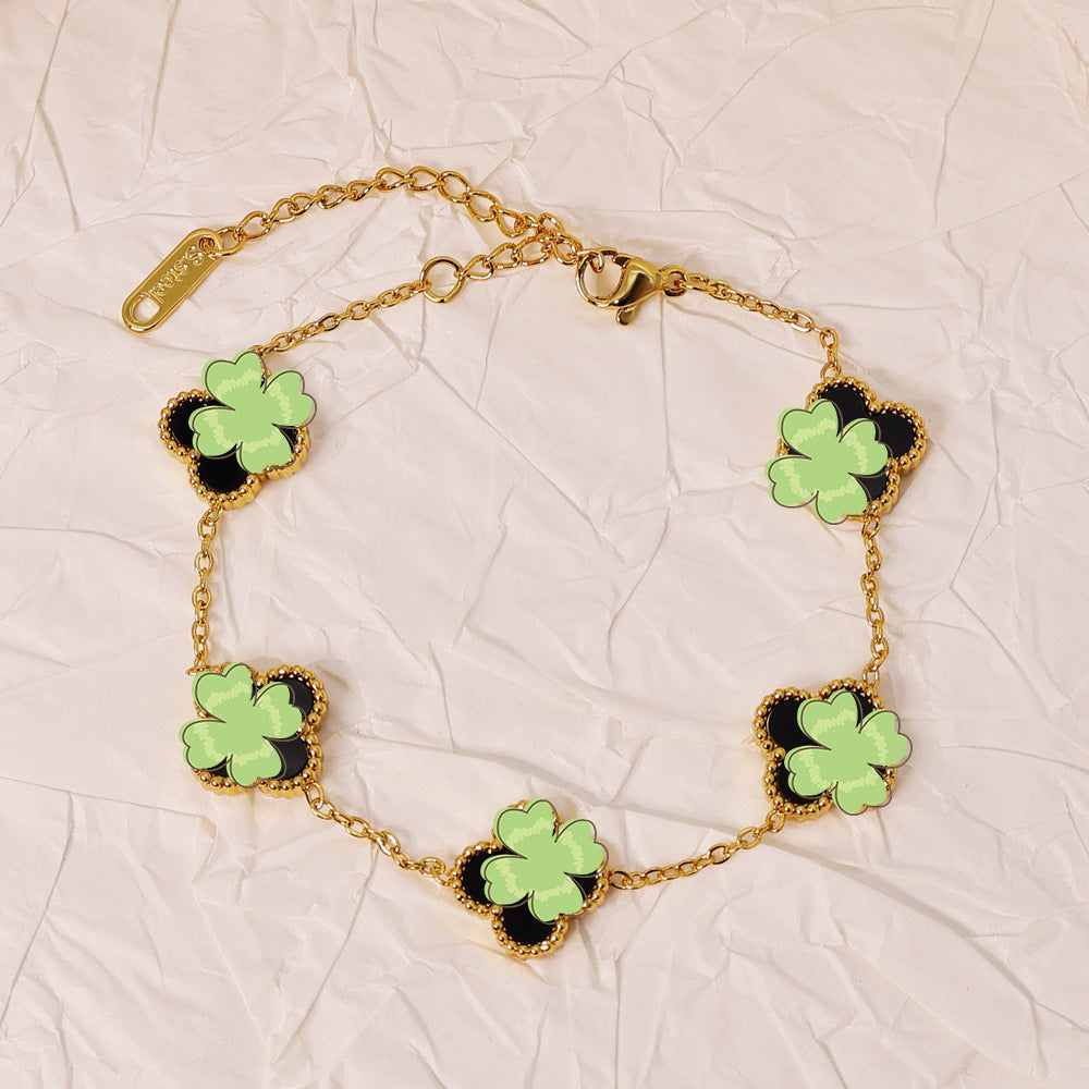 Bracelet Fortuna à pendentif trèfle, acier titane doré
