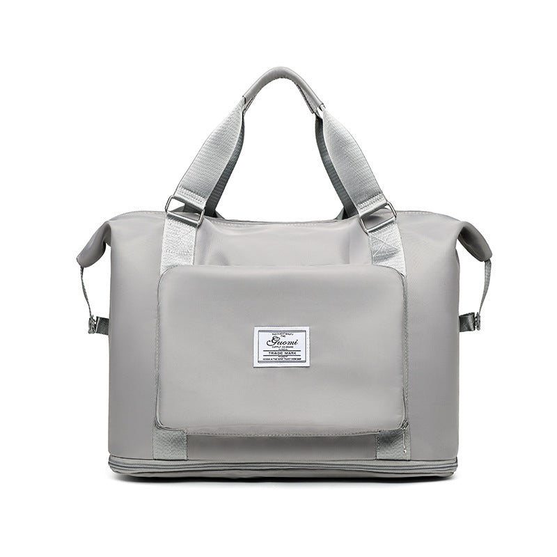 Sac de voyage 3 en 1 fixé sur une valise