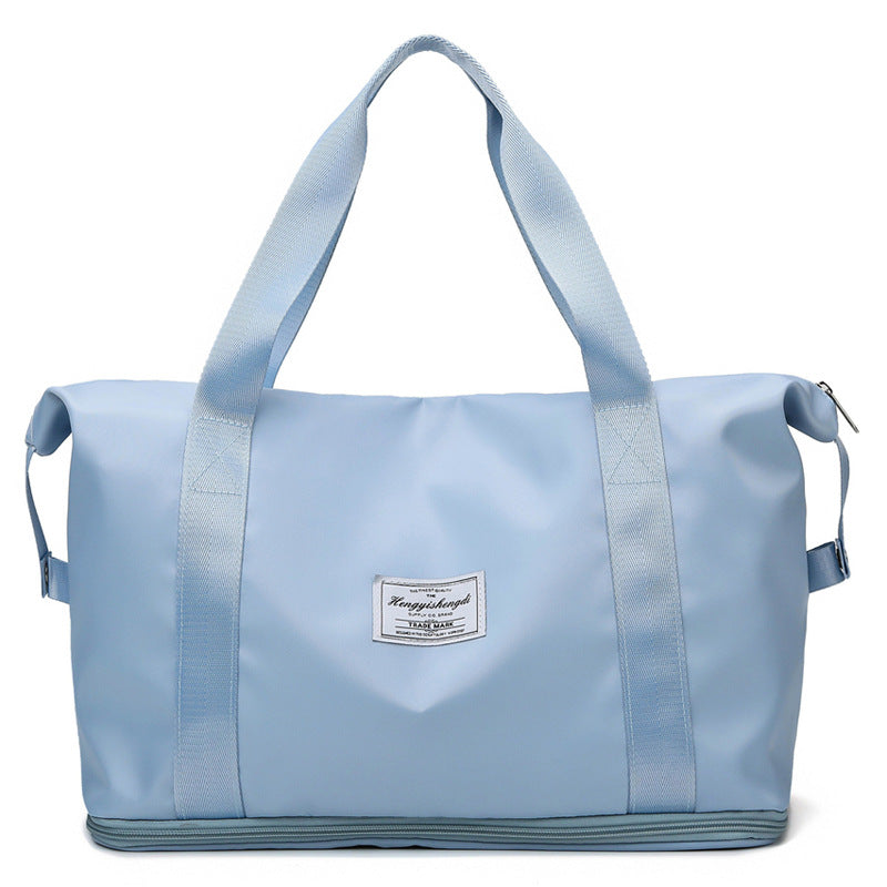 Sac de sport, détail des poches et de la fermeture zip